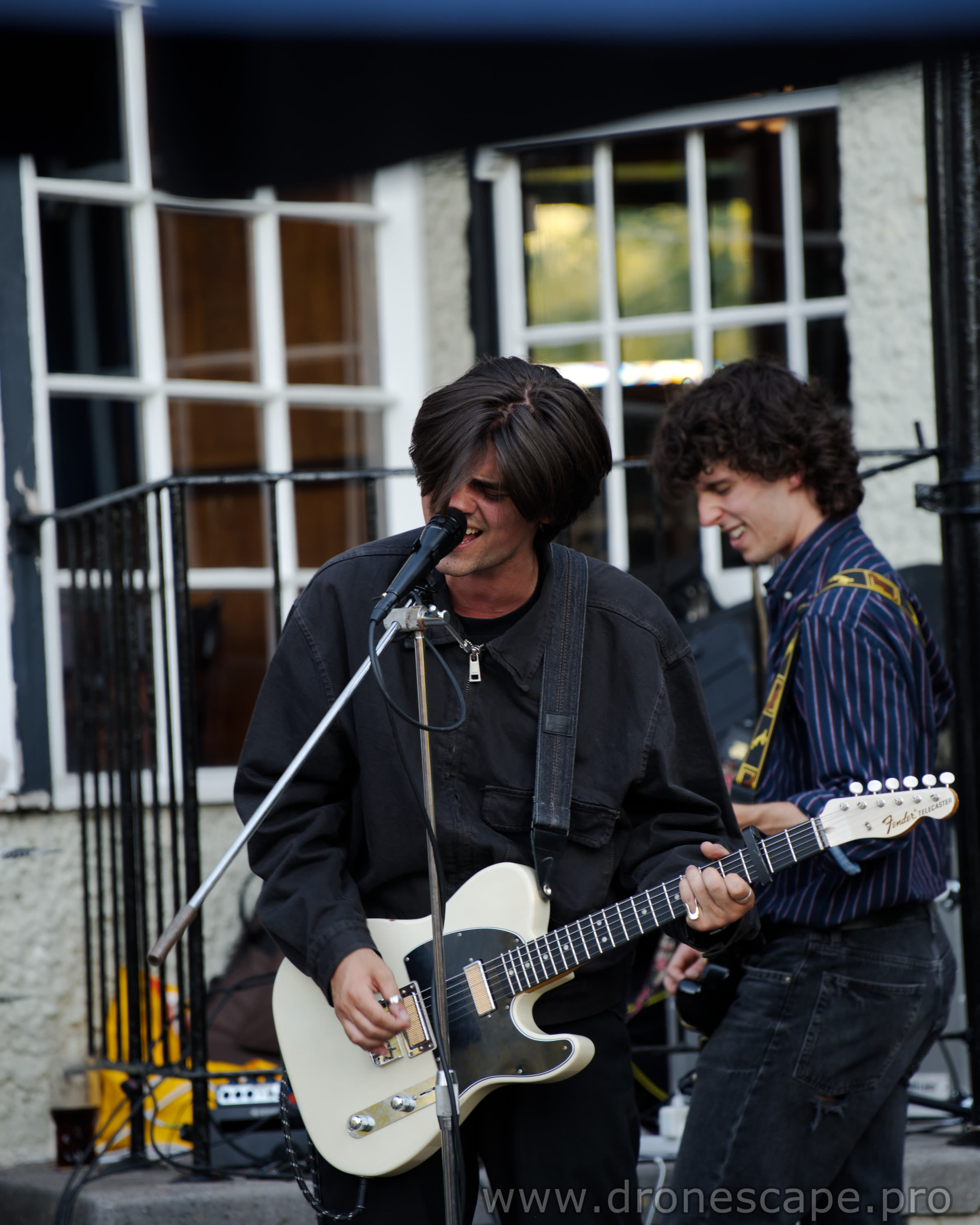 Vocalist and guitarist mid-performance