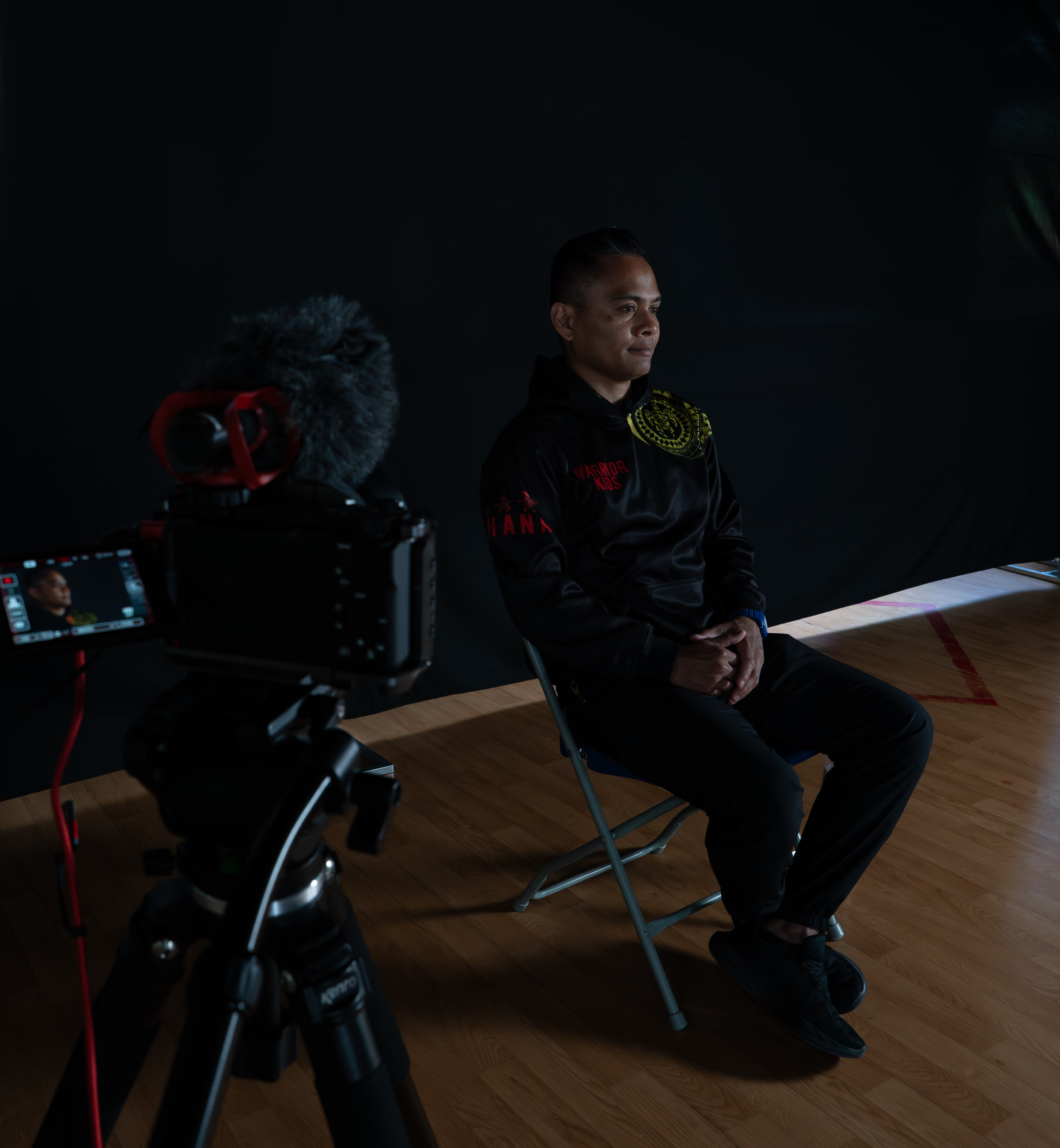Coach filmed during an interview at the martial arts club