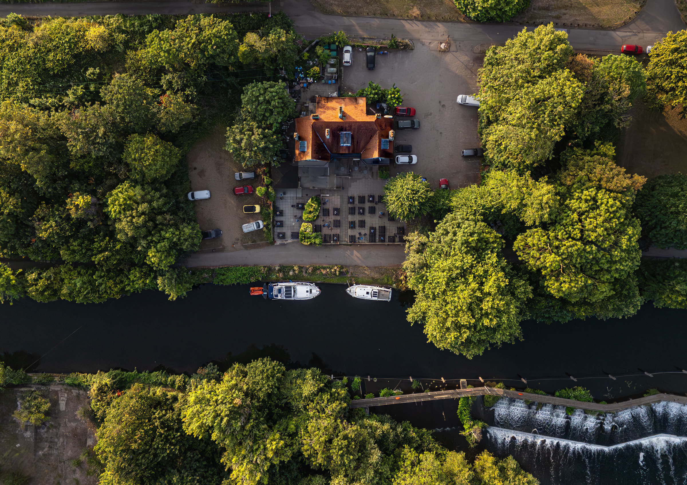Aerial view of The Weir Hotel beside the river