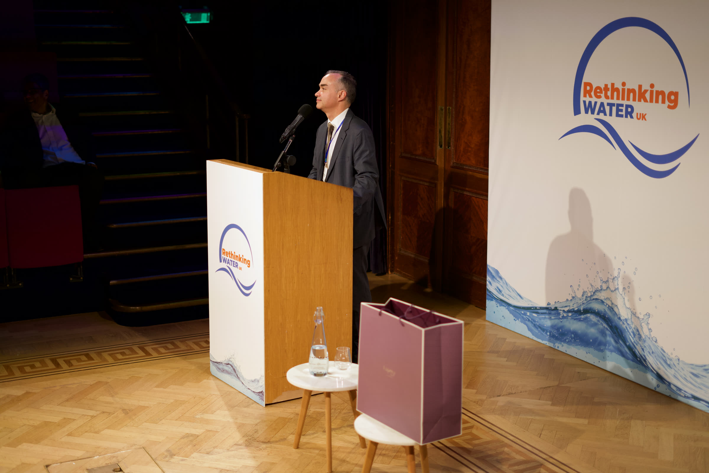 Speaker addressing the conference from the Rethinking Water lectern